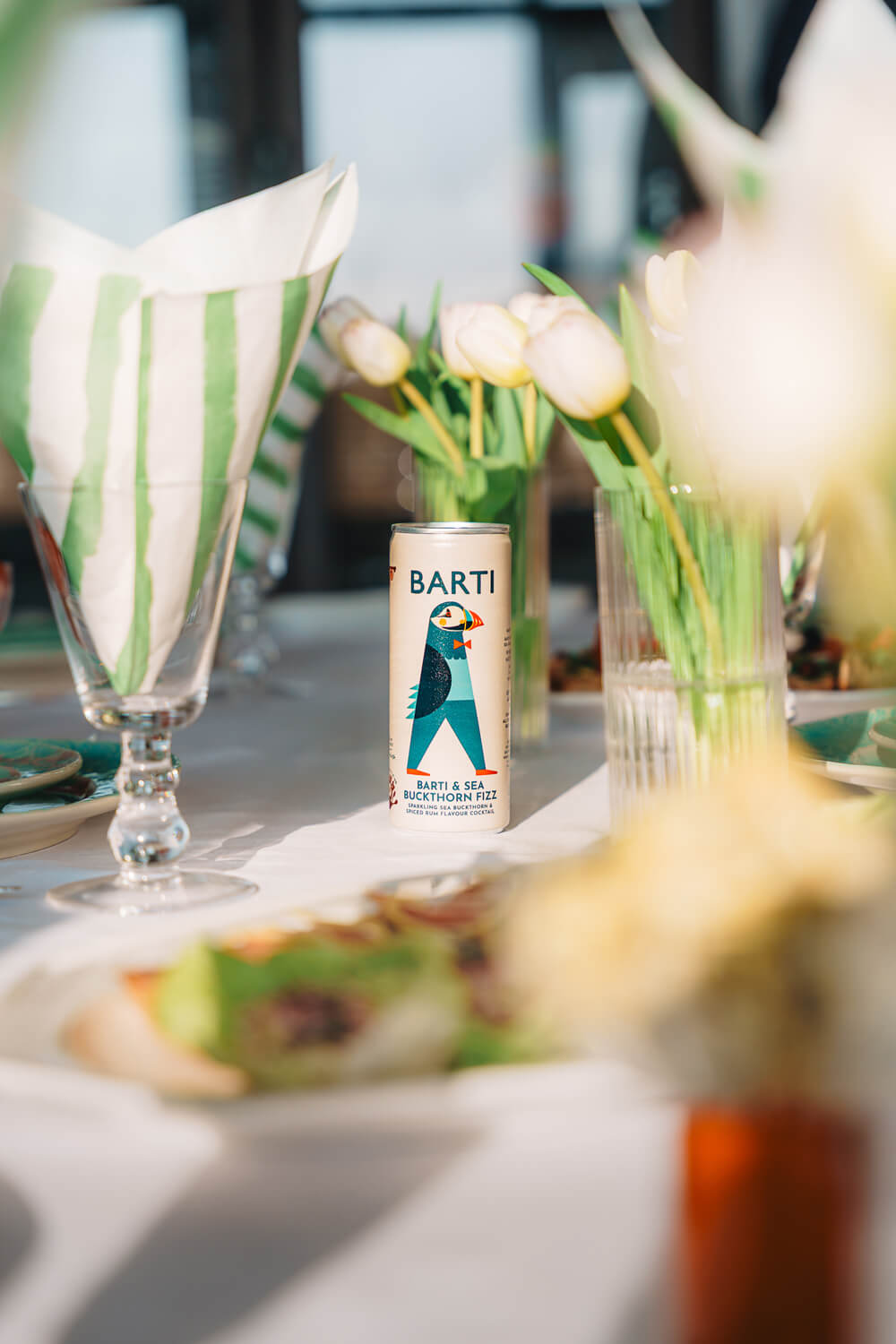 Barti drinks on a table setting